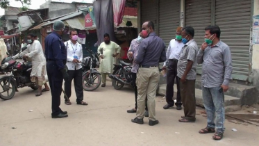 হিলিতে অকারণে ঘরের বাহির হওয়ায় ১৪ জনকে জরিমানা 