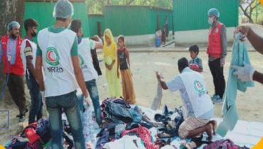 কোয়ারেন্টাইনে থাকা ৪১২ রোহিঙ্গাকে পোশাক দিয়েছে রেড ক্রিসেন্ট