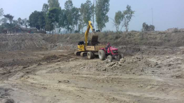 তাড়াশে পুকুর খননে নষ্ট হচ্ছে আবাদি জমি