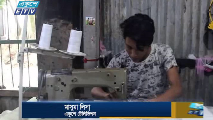 ঈদকে সামনে রেখে ব্যস্ত মুন্সীগঞ্জের পোশাক কারখানার কারিগররা