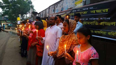 তাজরিন ট্র্যাজেডিতে নিহতদের স্মরণে মোমবাতি প্রজ্জলন