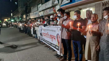 একুশে আগস্ট নিহতদের স্মরণে মোমবাতি প্রজ্জলন স্বেচ্ছাসেবক লীগের