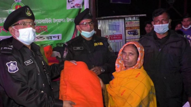 নাটোরে শীতার্তদের পাশে র‌্যাব 
