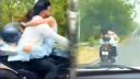 বান্ধবীকে কোলে নিয়ে বাইক চালনা,  ৭৫ হাজার টাকা জরিমানা করল পুলিশ