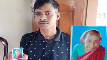 মাকে খুঁজে পেতে ছবি হাতে পথে পথে ঘুরছেন ছেলে