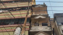 ভাঙা হচ্ছে ভূমিকম্পে হেলে পড়া চারতলা ভবনটি 