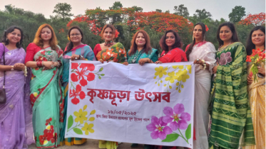 রাজধানীতে কৃষ্ণচূড়া উৎসবে মেতে উঠলেন প্রকৃতিপ্রেমীরা