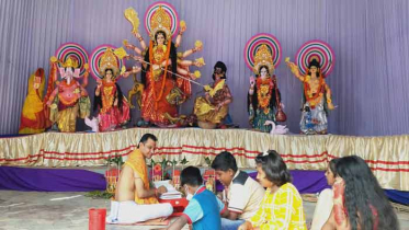 নওগাঁয় শারদীয় দুর্গোৎসব উপলক্ষে সরকারি চাল বিতরণ