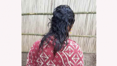নেশার টাকা না পেয়ে স্ত্রীর চুল কেটে দিল স্বামী