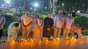 গণহত্যা দিবসে সম্প্রীতি বাংলাদেশের মোমবাতি প্রজ্জ্বলন