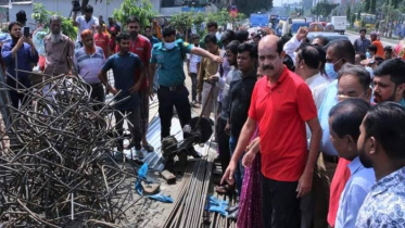 ফুটপাতে রাখা নির্মাণ সামগ্রী নিলামে বিক্রি করল ডিএনসিসি