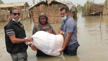 সিরাজগঞ্জে বন্যার্তদের পাশে র‍্যাব