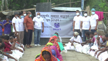 সিরাজগঞ্জে বন্যা দুর্গতদের মাঝে ত্রাণ বিতরণ