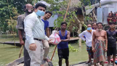 সরাইলে বন্যার্তদের মাঝে ত্রাণ সহায়তা প্রদান