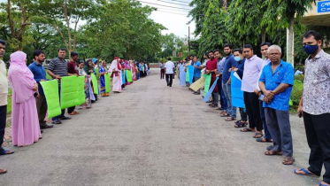 ইউজিসির অভিন্ন নীতিমালা বাতিলের দাবিতে শাবিপ্রবিতে মানববন্ধন